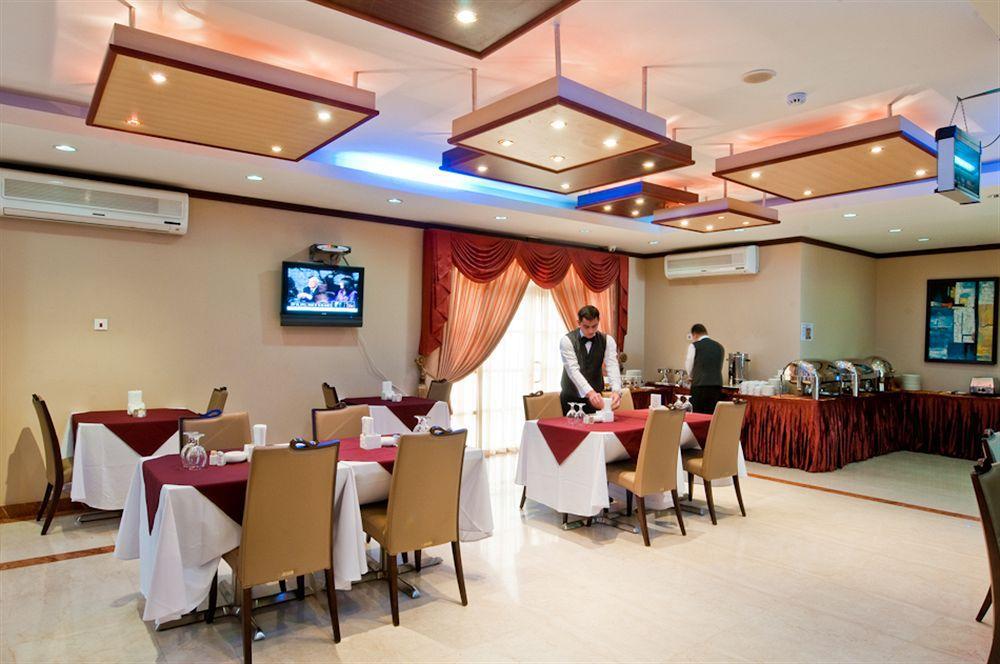 La Villa Palace Hotel Doha Restaurante foto
